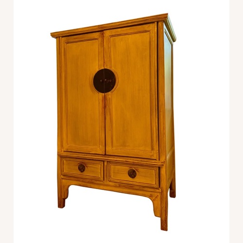 Used Antique Yellow Wood Armoire for sale on AptDeco
