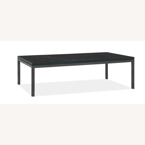 Used Parsons Black Stone Coffee Table for sale on AptDeco