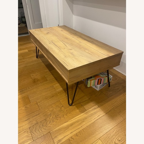 Used Coaster Fine Furniture Natural Wood Coffee Table for sale on AptDeco
