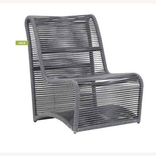 Used Milano Dark Gray Aluminum Accent Chairs for sale on AptDeco