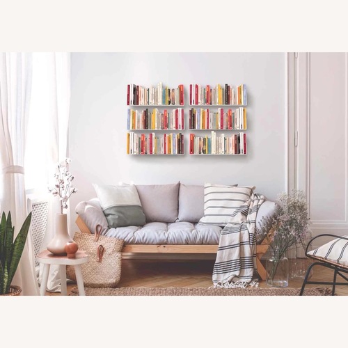 Used Minimalist Floating Wall Book Shelf for sale on AptDeco