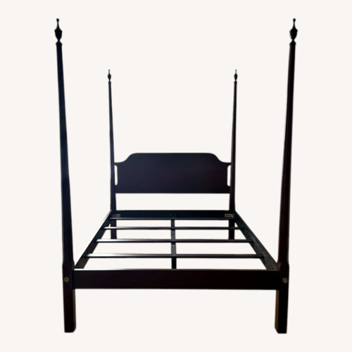 Used Dark Brown Wood Queen Bed for sale on AptDeco