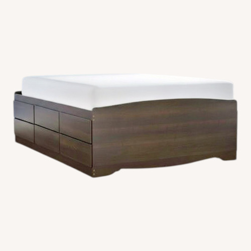 Used 12-Drawer Queen Storage Bed – Dark Brown Wood for sale on AptDeco