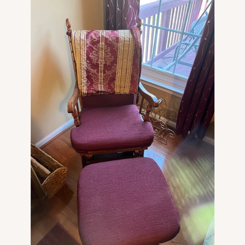 Used Wood Glider With Burgundy Cushions for sale on AptDeco
