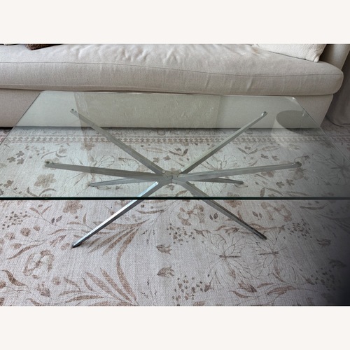 Used Aviator Glass Coffee Table for sale on AptDeco