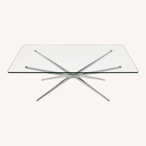 Used Aviator Glass Coffee Table for sale on AptDeco