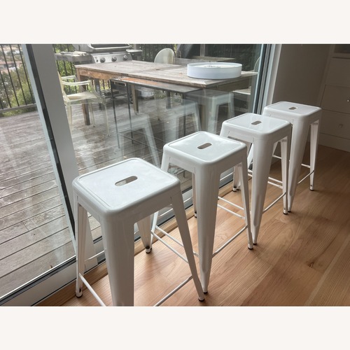 Used Tolix Marais White Metal Stools (Set of 4) for sale on AptDeco