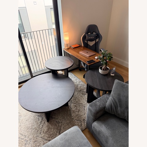 Used Bob's Discount Furniture Cascade Black Round Coffee & 2 End Table Set for sale on AptDeco