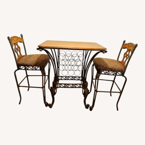 Used Iron Bistro Table Set with Built in Wine Rack for sale on AptDeco