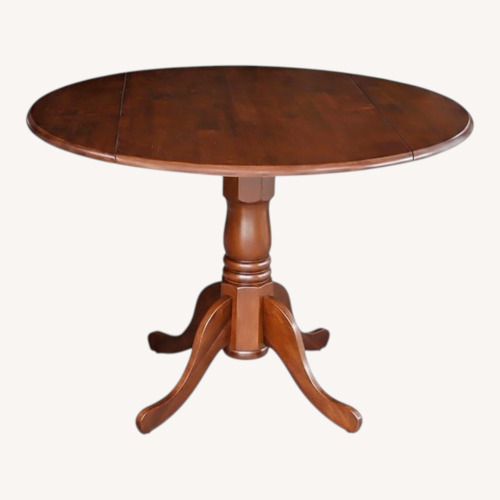 Used Amazon Dark Brown Wood Dining Table for sale on AptDeco