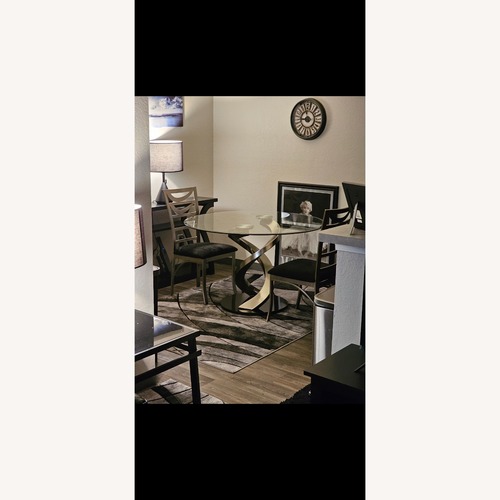 Used Amazon Jacreme Glass Top Round Dining Table for sale on AptDeco