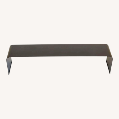 Used Modern Black Metal Shoe Rack - Anodic Black for sale on AptDeco