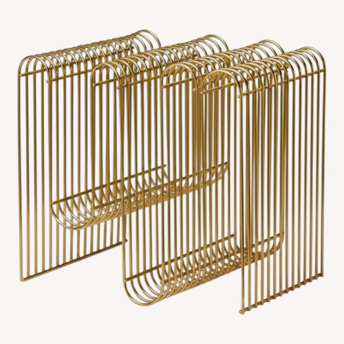 Used Curva Magazine Rack, Gold for sale on AptDeco