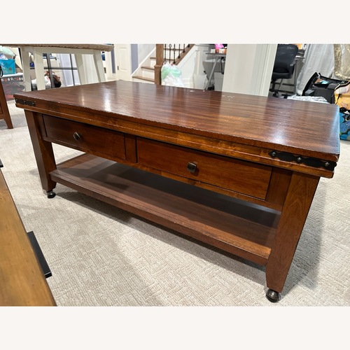 Used Bob's Discount Furniture Dark Brown Coffee Table for sale on AptDeco