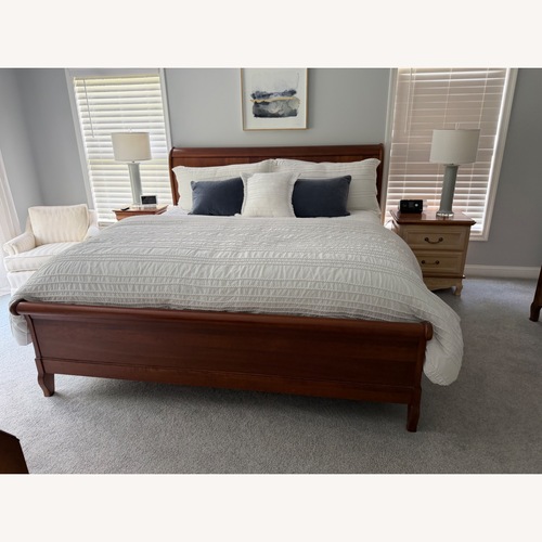 Used Ethan Allen Dark Brown Wood King Bed for sale on AptDeco