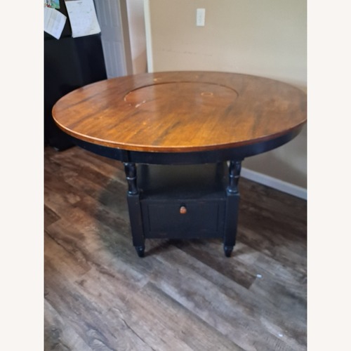 Used Dining Table with a Lazy Susan for sale on AptDeco