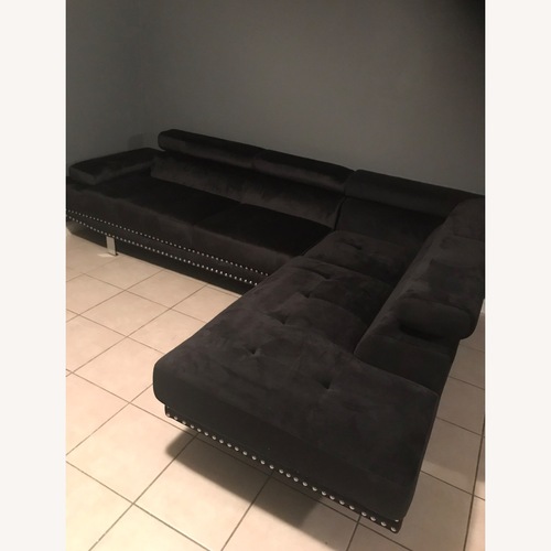 Used Black Chic Sectional Sofa for sale on AptDeco