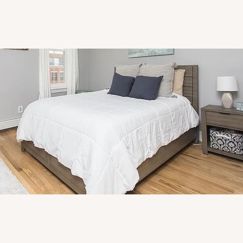 Used Macy's Tribeca Dark Gray Wood Queen Bed for sale on AptDeco
