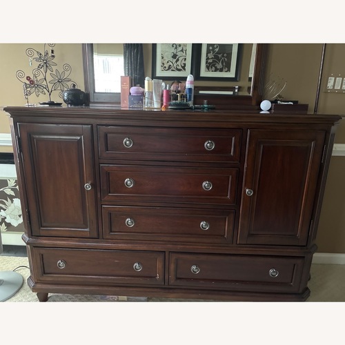Used Vintage/Antique Dark Brown Wood Dresser for sale on AptDeco