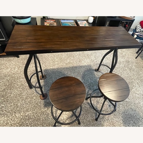 Used Amazon Dark Brown Wood Dining Set for sale on AptDeco