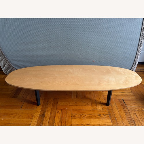 Used Floyd Light Brown Wood Oval Coffee Table for sale on AptDeco