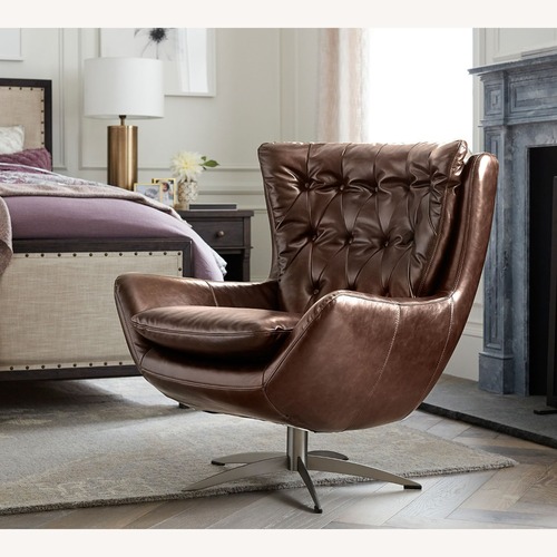 Used Pottery Barn Tufted Wells Leather Swivel Armchair for sale on AptDeco