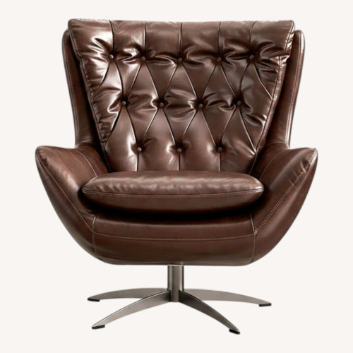 Used Pottery Barn Tufted Wells Leather Swivel Armchair for sale on AptDeco