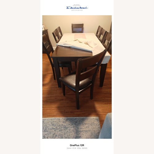 Used Dark Brown Wood Dining Chair for sale on AptDeco