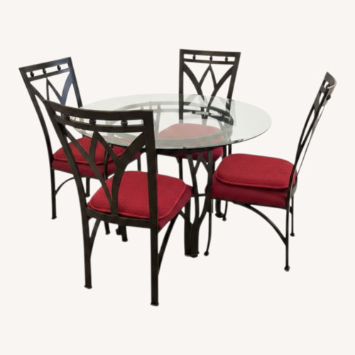 Used Black Glass Dining Set for sale on AptDeco