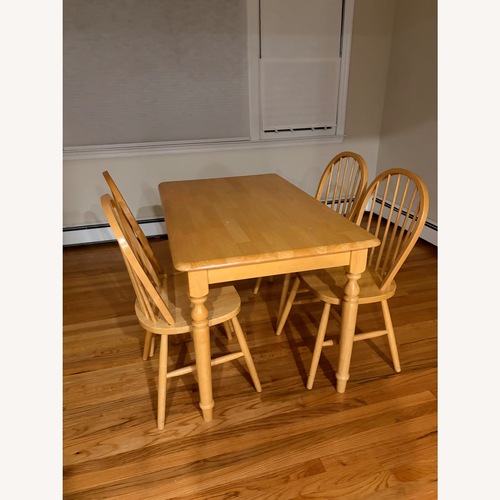 Used Natural Wood Dining Table for sale on AptDeco