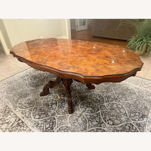 Used Vintage/Antique Natural Wood Dining Table for sale on AptDeco