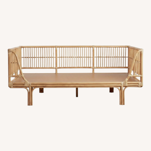 Used World Market Honey Rattan Twin Daybed for sale on AptDeco