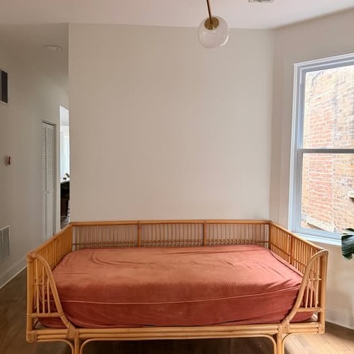 Used World Market Honey Rattan Twin Daybed for sale on AptDeco