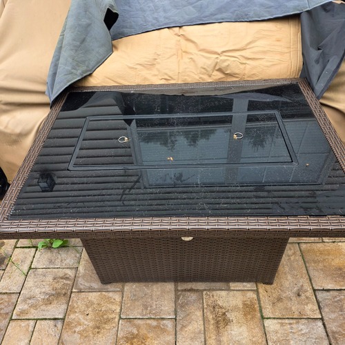 Used Dark Brown Fire Pit for sale on AptDeco