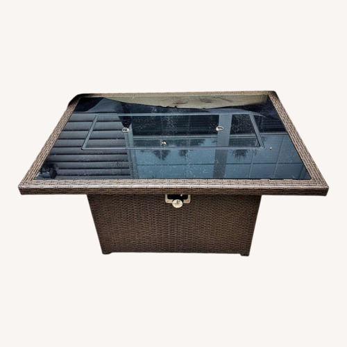 Used Dark Brown Fire Pit for sale on AptDeco