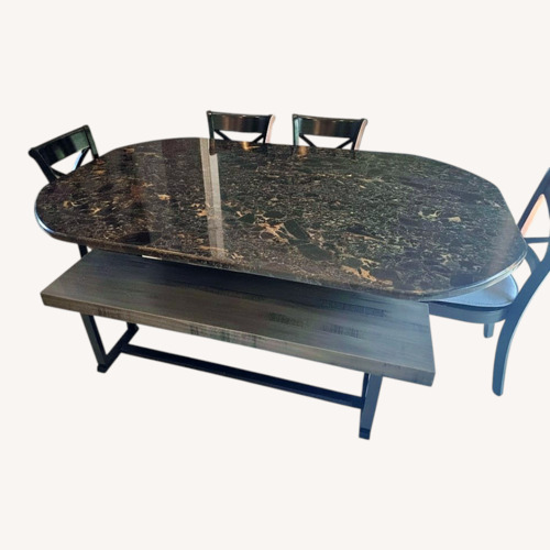 Used Custom Black Stone Dining Table/Set for sale on AptDeco