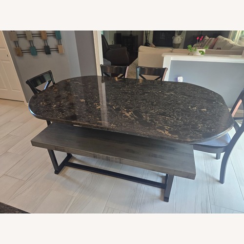 Used Custom Black Stone Dining Table/Set for sale on AptDeco
