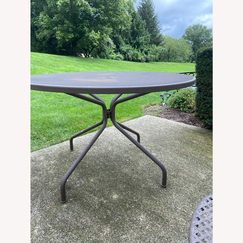 Used EMU Cambi 48-Inch Round Steel Outdoor Dining Table for sale on AptDeco