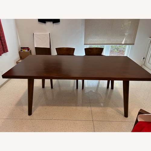 Used Room & Board Maria Yee Dark Brown Wood Dining Table for sale on AptDeco