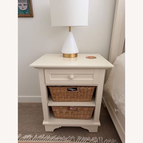 Used Pottery Barn Cynthia Antique White Bedside Table for sale on AptDeco