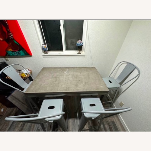 Used Light Gray Metal Dining Set for sale on AptDeco