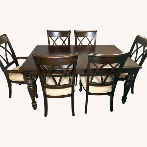 Used Dark Brown Wood Dining Set for sale on AptDeco