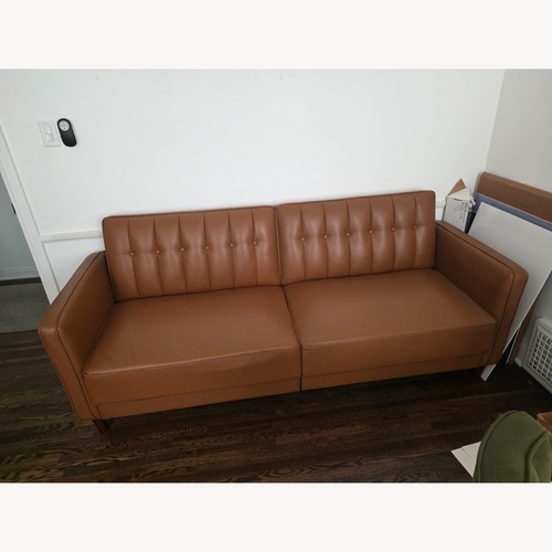 Used Dark Brown Leather Futon for sale on AptDeco