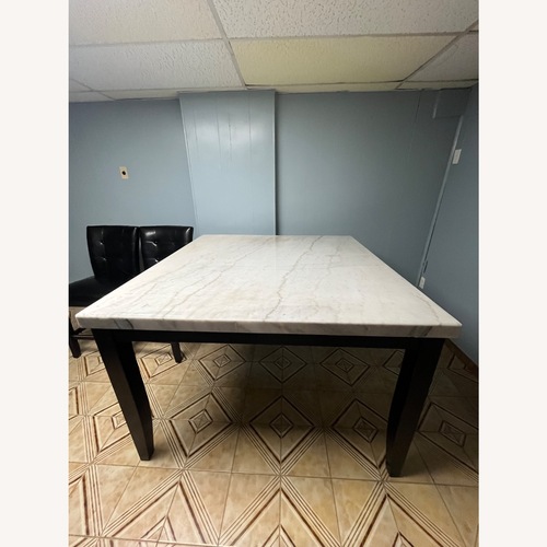 Used Ashley Furniture Dark Brown Leather Dining Set for sale on AptDeco