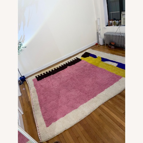 Used Pink Wool Area Rug 8' x 10' for sale on AptDeco