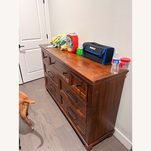 Used Ashley Furniture Dark Brown Wood Dresser for sale on AptDeco