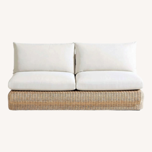 Used Crate & Barrel Ipanema Wicker Armless Outdoor Sofa for sale on AptDeco