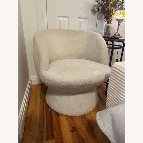 Used Boucle Off-white Swivel Accent Chair  for sale on AptDeco
