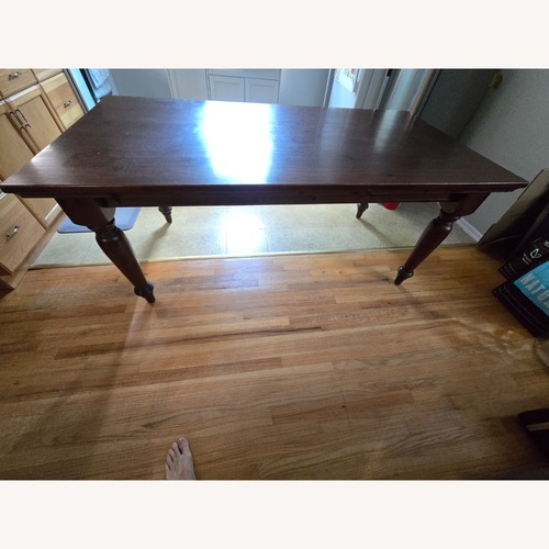 Used Vintage/Antique Finds Dark Brown Dining Table for sale on AptDeco