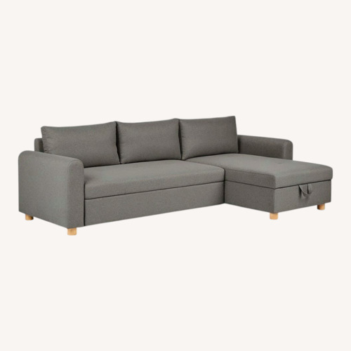 Used Article Nordby 104" Reversible Sleeper Sectional - Henge Gray for sale on AptDeco